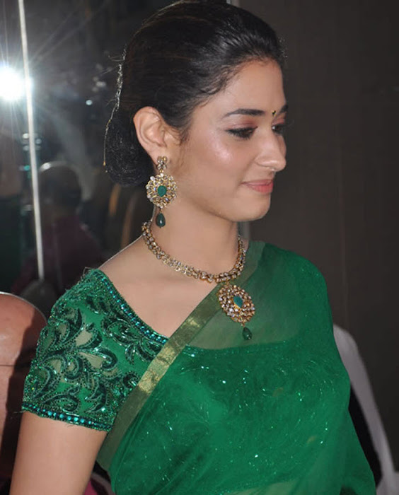 tamannah looking in green saree cute stills